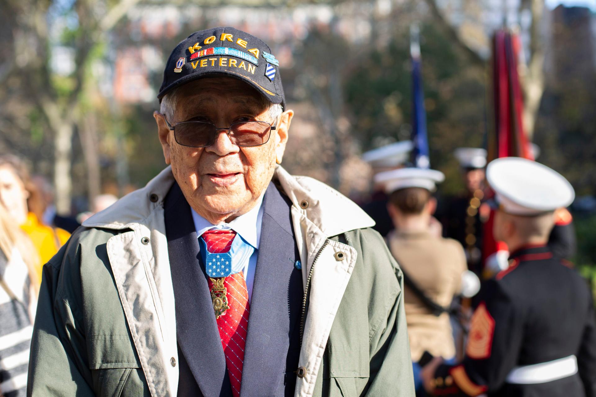 <p>Medal of Honor recipient Army Staff Sgt. Hiroshi “Hershey” Miyamura is pictured at the 2019 New York City Veterans Day Parade, Nov. 11. Miyamura served as a grand marshal of the parade, which marked its centennial anniversary and honored the Marine Corps as its featured service. Formed Nov. 10, 1775, as naval augment forces capable of fighting both at sea and on shore, the Marine Corps has secured freedom in every major conflict America has faced. Together, the Navy-Marine Corps Team enables the joint force to partner together and operate on behalf of national defense in this era of great power competition. Steeped in the core values of honor, courage and commitment, Marines bring moral, physical, and intellectual strength to every situation. When their time in uniform is done, Marines use those qualities to continue to serve their communities. (U.S. Marine Corps photo by Cpl. Mario Ramirez)</p>
